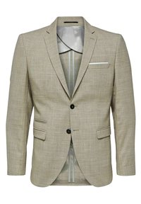 Ljusbeige blazer i texturerat tyg, med slagkrage, två framfickor, en bröstficka och enfärgad knappstängning.