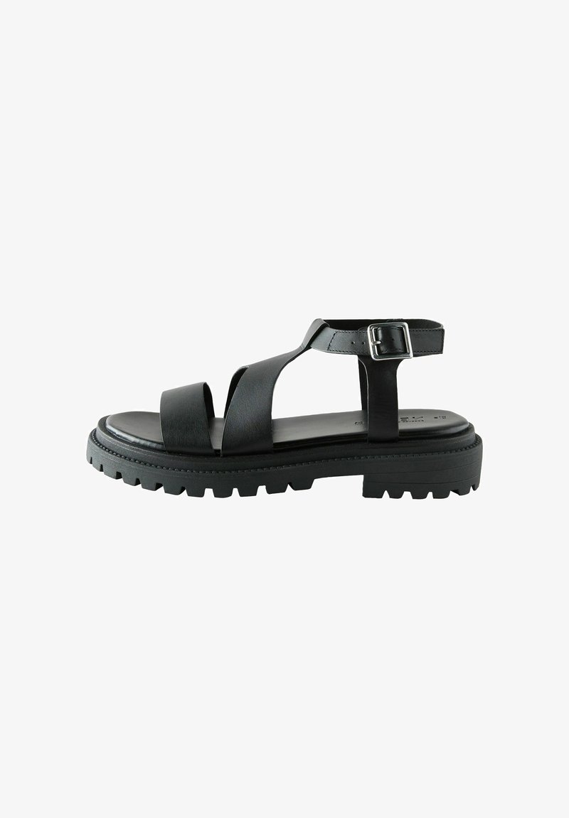 Mustad nahast sandaal, millel on laiad ristipidemed, reguleeritav hüppari rihm kinnitusega ning paks kummist põhi, millel on laterna mustriga sooned.