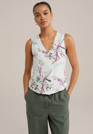Ärmelloses Blumenshirt in Hellgrün, mit lila und pinken Mustern, V-Ausschnitt und Knopfverschluss vorne. Glatte Stofftextur.