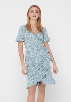 Floral wrap dress in light blue with short flutter sleeves, V-neckline, ruffled hem, and a fitted waist. Features scattered multi-colored floral print.