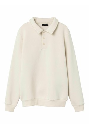 Langärmliger cremefarbener Pullover mit Kragen, drei Knöpfen am Hals und gerippten Bündchen sowie Saum.