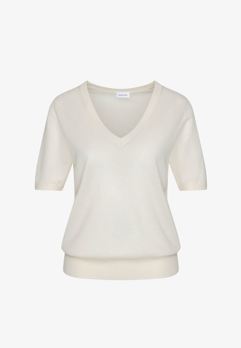Chemise en maille à manches courtes couleur crème avec col en V et ourlet côtelé, présentée sur un fond blanc.