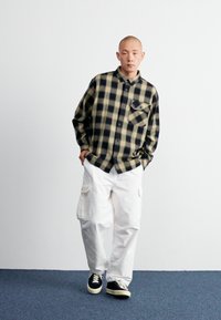 Carhartt WIP STANTON PANT - Kapsáče - off-white