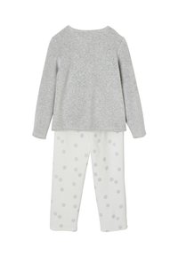 Gray long-sleeve top with a rounded neckline, paired with white pants featuring gray polka dots. Soft texture, casual design.