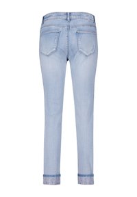 Ljusblå denimjeans med en figurnära silhuett, femfickorsdesign och kontrasterande broderade muddar med ett spetsmönster.