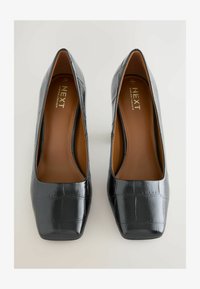 Sélectionné, black croc effect