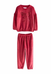 Red, plush two-piece outfit featuring a long-sleeve top with a sequined bow design and elastic-waist pants. Soft texture throughout.