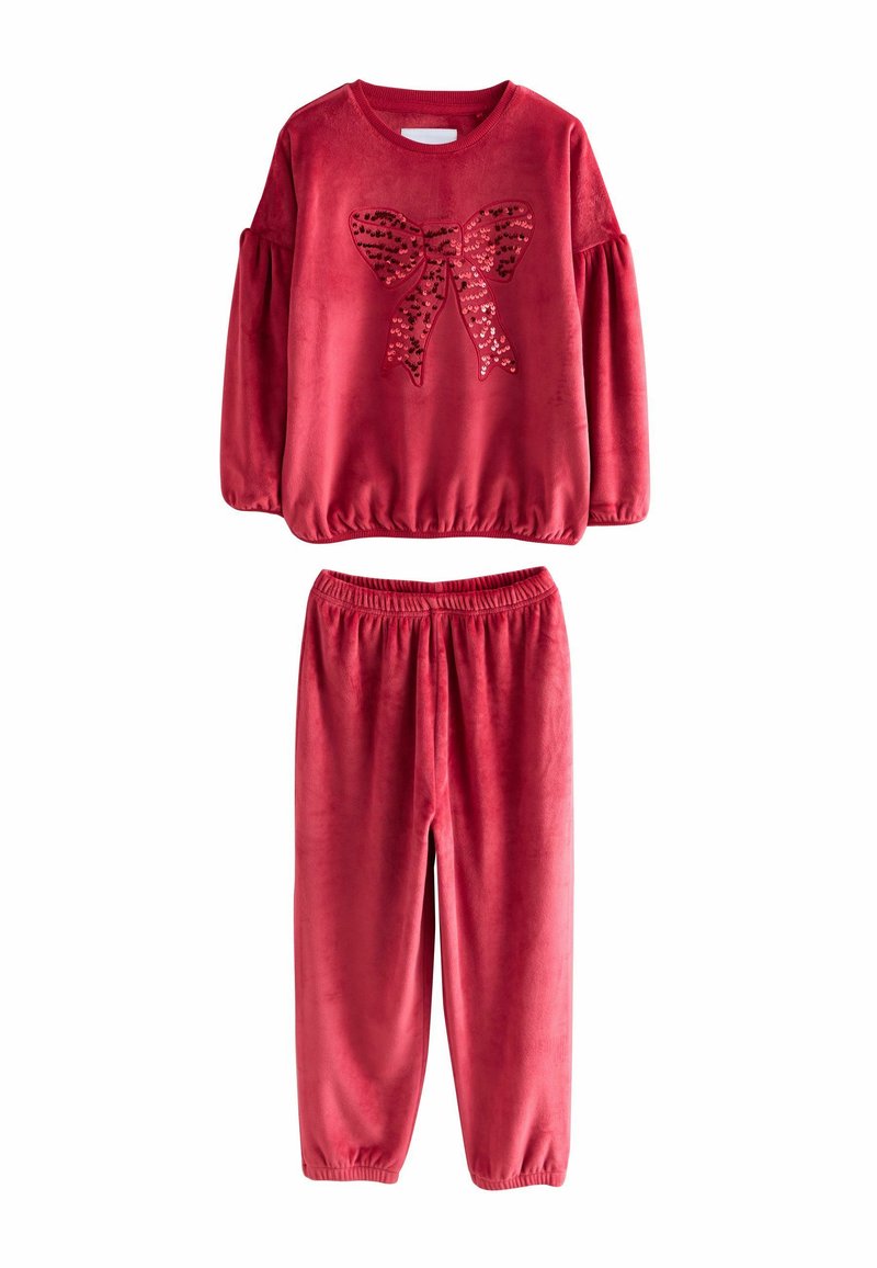 Red, plush two-piece outfit featuring a long-sleeve top with a sequined bow design and elastic-waist pants. Soft texture throughout.