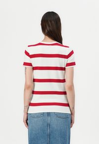 Tommy Hilfiger SCRIPT - Print T-shirt - iovry /med red