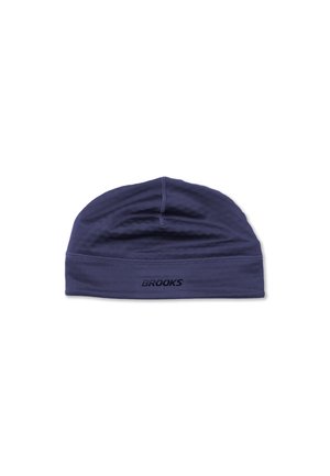 Navyblauwe lichte stoffen beanie van het merk Brooks met zichtbare stiksels op een witte achtergrond.