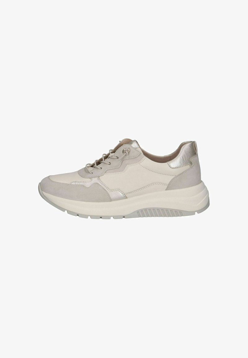 Beige sneakers featuring a mix of smooth and suede textures, with a metallic accent on the heel and a chunky white sole.