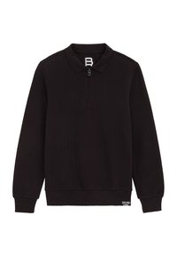 Schwarzes Langarmoberteil mit geripptem Stoff, Kragen und halbem Reißverschluss. Mit einem Logopatch am Saum.