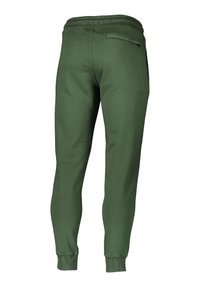 Grüne Jogginghose aus weichem Stoff, mit elastischem Bund, schmal zulaufenden Beinen und einer Gesäßtasche. Glatte Textur und einfaches Design.