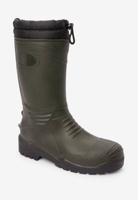 Green rubber waterproof boot with a textured finish, reinforced toe, and black fabric cuff. Features a drawstring for adjustable fit.