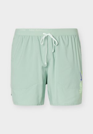 Mintgrønne Nike løbeshorts med hvid snøre i taljen og subtilt logo i siden, vist på en ensfarvet hvid baggrund.