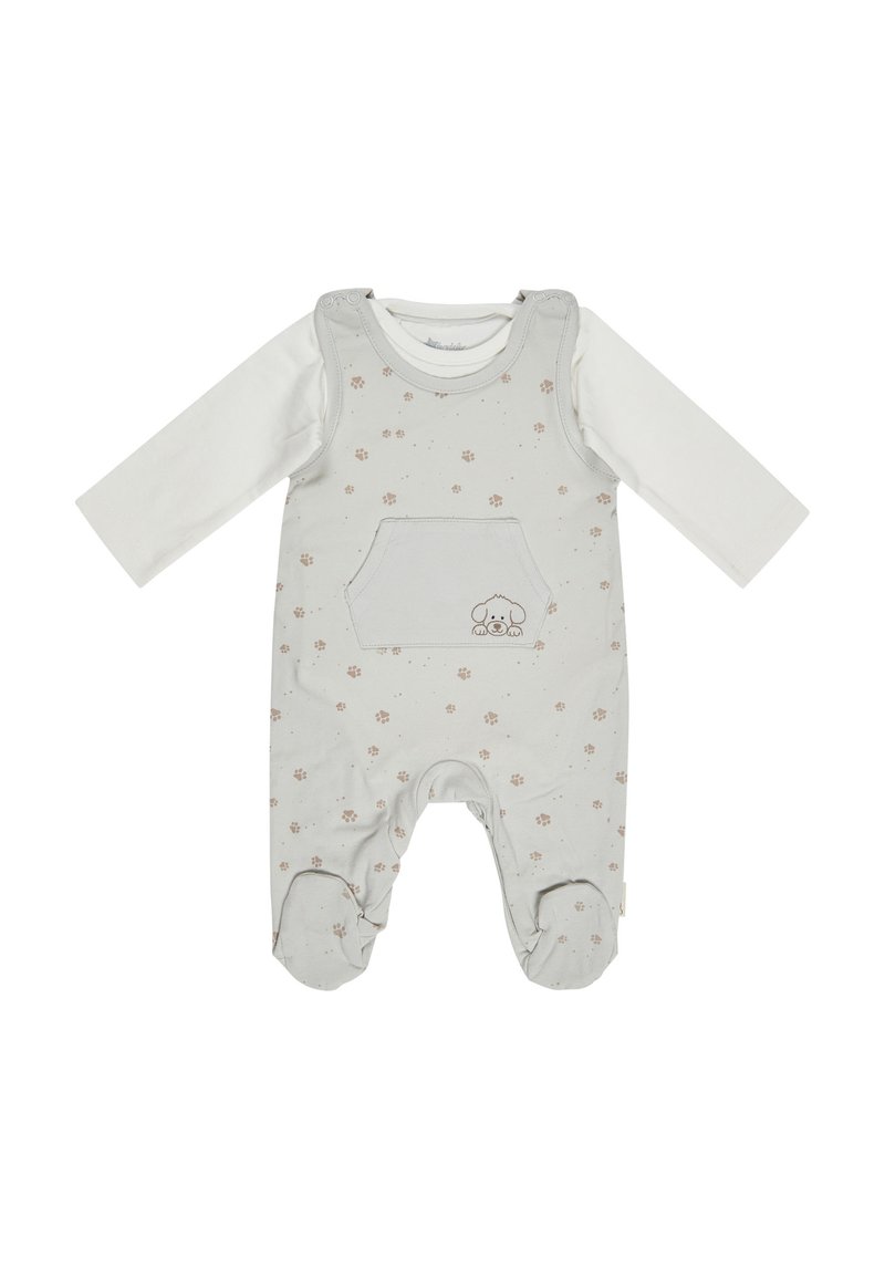 Cremfarbener und beiger Babyschlafanzug mit langen Ärmeln, Pfotenabdruckmuster, Fronttasche und gesticktem Hundegesicht auf der Tasche.