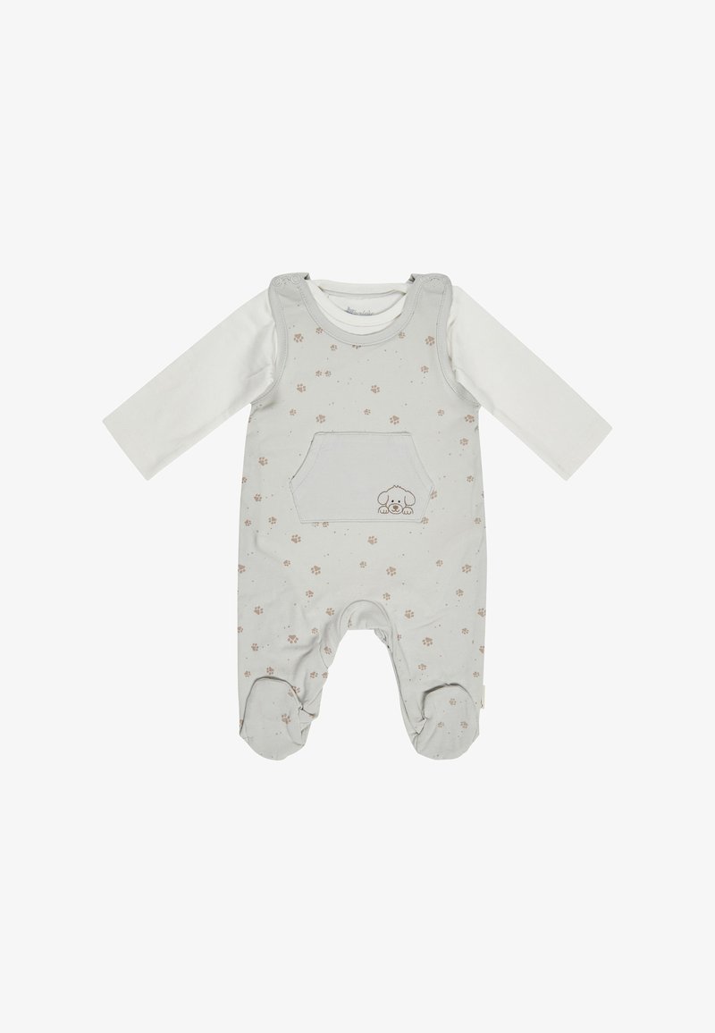 Cremfarbener und beiger Babyschlafanzug mit langen Ärmeln, Pfotenabdruckmuster, Fronttasche und gesticktem Hundegesicht auf der Tasche.