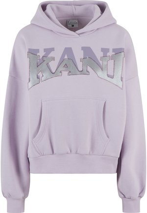 Lilla kapuutsiga särk, millel on ees ilusalongtasku ja julge hõbedane "KANI" logo, mis on ääristatud rhinestone'idega. Pehme kangas, soonikkoes varrukaotsad ja hem.