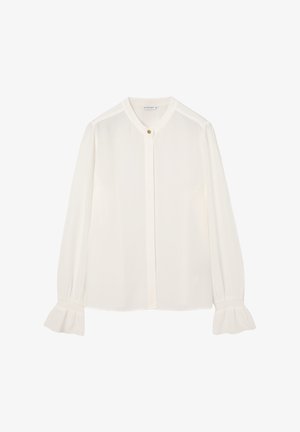 Bluza albă, material ușor, închidere cu nasturi, guler rotund, mâneci lungi cu manșete adunate, textură fină, luciu subtil.