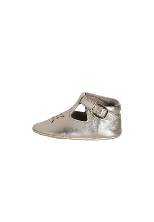 Metallic gold baby shoe with T-strap, buckle closure, and cutout flower pattern on the front, displayed on white background.