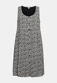 Robe noire sans manches avec motif floral blanc, encolure dégagée et fermeture à boutons sur le devant.