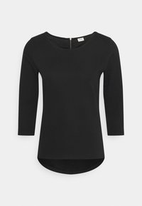 Haut noir à manches longues avec un décolleté en U, texture côtelée structurée et ourlet arrondi. Présente un discret détail de fermeture éclair au dos.