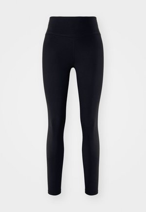 Leggings negros con una alta cinturilla, hechos de una tela elástica, que presentan una textura suave y una silueta ajustada hasta los tobillos.