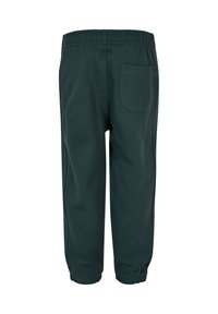 Dunkelgrüne Jogginghose mit elastischem Bund, Bündchen am Saum und einer aufgesetzten Tasche auf der Rückseite. Weicher Stoff und lockere Passform.