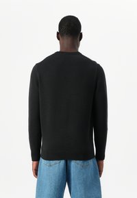 Timberland GRAPHIC SWEATER - Džemperis - black