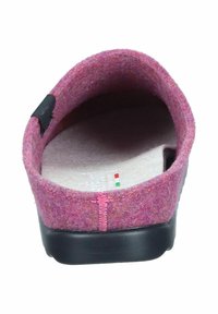 Felt slipper in pink with black rubber sole. Interior features beige insole; pink stitching and small Italian flag detail visible.