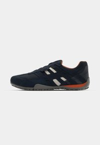 Navy blue athletic shoes with a mesh upper, contrasting grey and white stripes, and an orange accent on the sole. Textured rubber outsole.
