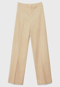 Pantalons larges beige à rayures verticales, confectionnés dans un tissu lisse. Dotés d'une taille plate et sans poches visibles.