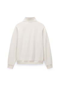 White pullover with a high collar, made of soft fabric. Features long sleeves and a ribbed hem. Smooth texture, minimal design, no visible patterns.