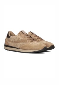 Beige sneakers with a textured suede upper, featuring brown laces, a smooth leather heel accent, and a dark rubber sole.