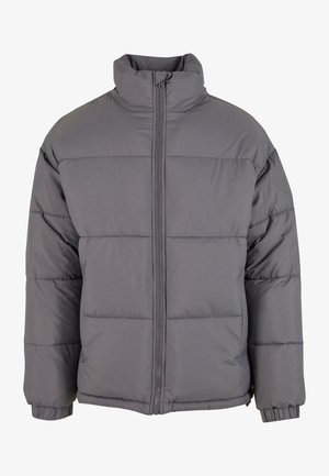 Gray puffer jacket with a high collar, zip closure, quilted texture, and elastic cuffs. Front features horizontal stitching for insulation.