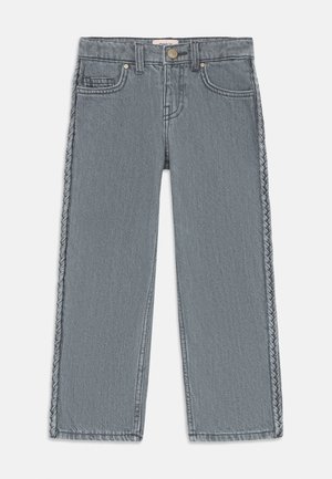Gray denim jeans with a straight leg, featuring braided side accents, five-pocket design, and a metal button closure at the waistband.