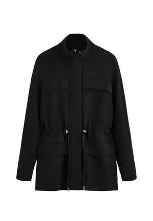 Black long-sleeve jacket with high collar, front zipper concealed by placket, adjustable drawstring waist, and two large flap pockets.