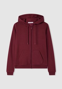 Felpa con zip color bordeaux realizzata in tessuto morbido, dotata di una comoda tasca a marsupio, cappuccio con cordini e orli e polsini a costine.