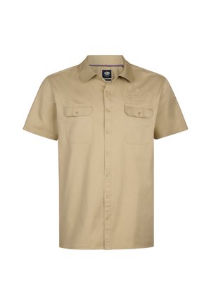 Chemise beige à manches courtes en coton, dotée d'une fermeture boutonnée sur le devant, de deux poches poitrine et d'un logo brodé sur le côté gauche.