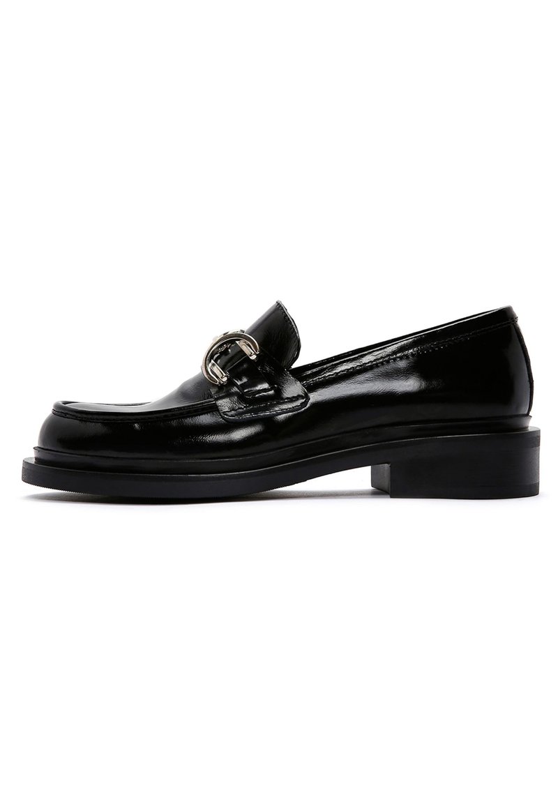 Black patent leather loafer with a rounded toe, small block heel, and a decorative silver buckle on the vamp. Smooth texture.