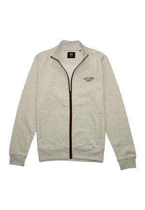 Veste zippée gris clair en tissu doux, dotée d'un col montant, d'accents de fermeture éclair bordeaux et d'un petit logo sur la poitrine gauche.