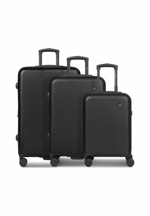 Black hardshell luggage set of three sizes features a smooth, textured finish, retractable handles, and 360-degree spinner wheels.