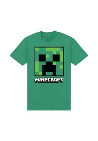 Zelené bavlněné tričko s pixelovaným zeleným obličejem creepera uvnitř černého čtverce, s textem "MINECRAFT" v bílé barvě pod ním.