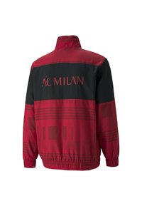 Rot und schwarz Windbreaker-Jacke mit "AC MILAN" auf dem Rücken, ausgestattet mit einem strukturierten Muster und elastischen Bündchen für eine optimale Passform.