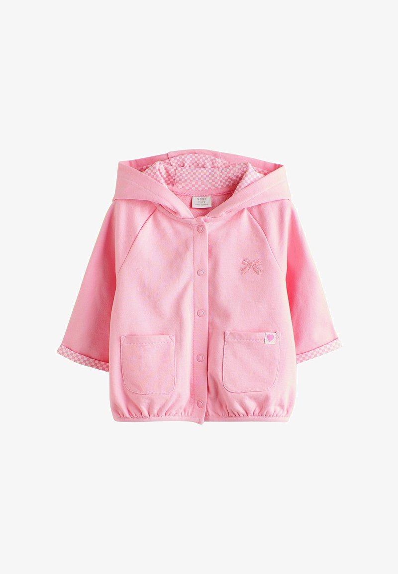 Lyserød hoodie med ternet inderfor, prydet med en broderet sløjfe, to forlommer og elastisk kant. Blødt materiale i bomuldsblanding.