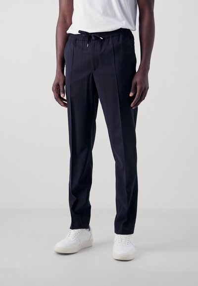 sandro ALPHA - Pantalones chinos - marine