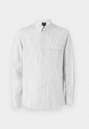 Stripete skjorte med knapper i hvit og marineblå, laget av lett stoff. Den har krage, lange ermer og en brystlomme.