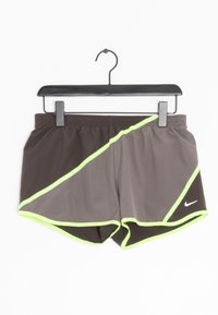 Nylonidrottsshorts i mörkbrun färg med neongröna accenter och sömmar. Har resårmidja och en liten vit Nike-logotyp.