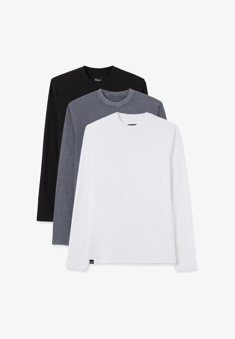 Set aus drei Langarm-T-Shirts in Schwarz, Dunkelgrau und Weiß. Baumwollstoff mit Rundhalsausschnitten und schlichten, einfarbigen Designs.