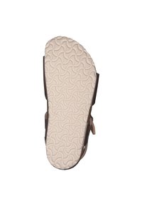 Bruine sandaalzool met een gestructureerde witte rubberen onderkant met een golvend patroon, ontworpen voor grip en stabiliteit.
